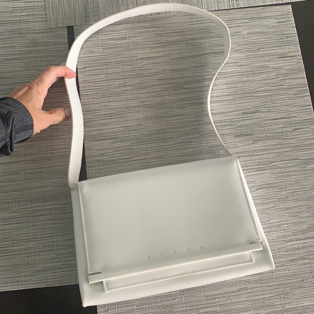 Pibra White leather handbag with chrome detail